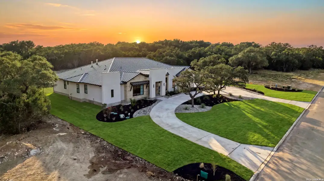 Front exterior of a new home in , Fair Oaks Ranch, TX, highlighting curb appeal (Image 1). Front exterior of a new home in , Fair Oaks Ranch, TX, highlighting curb appeal (Image 1).