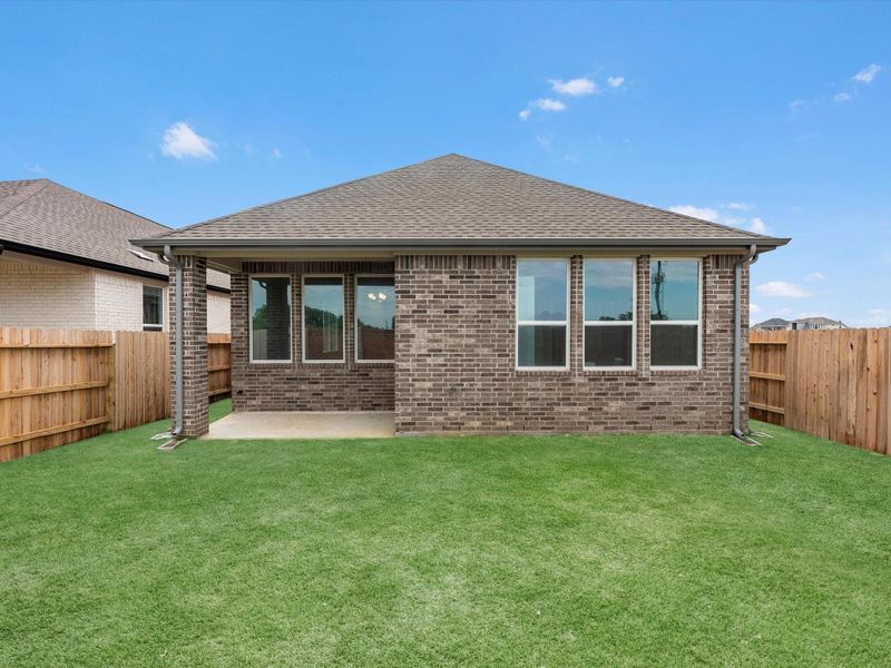 Exterior details and patio area of a home in Wildrye, Waller (Image 3). Exterior details and patio area of a home in Wildrye, Waller (Image 3).