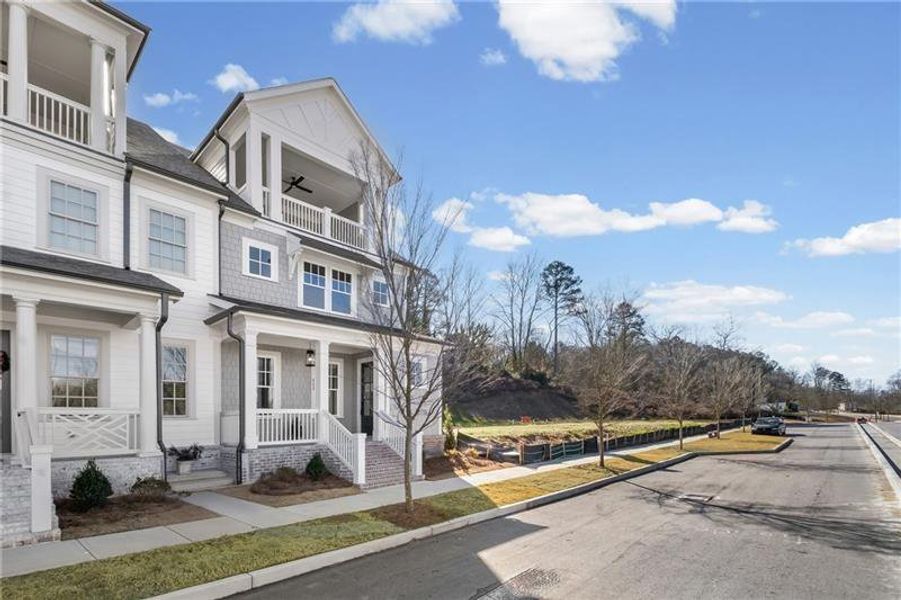 Front exterior of a new home in , Ball Ground, GA, highlighting curb appeal (Image 16). Front exterior of a new home in , Ball Ground, GA, highlighting curb appeal (Image 16).