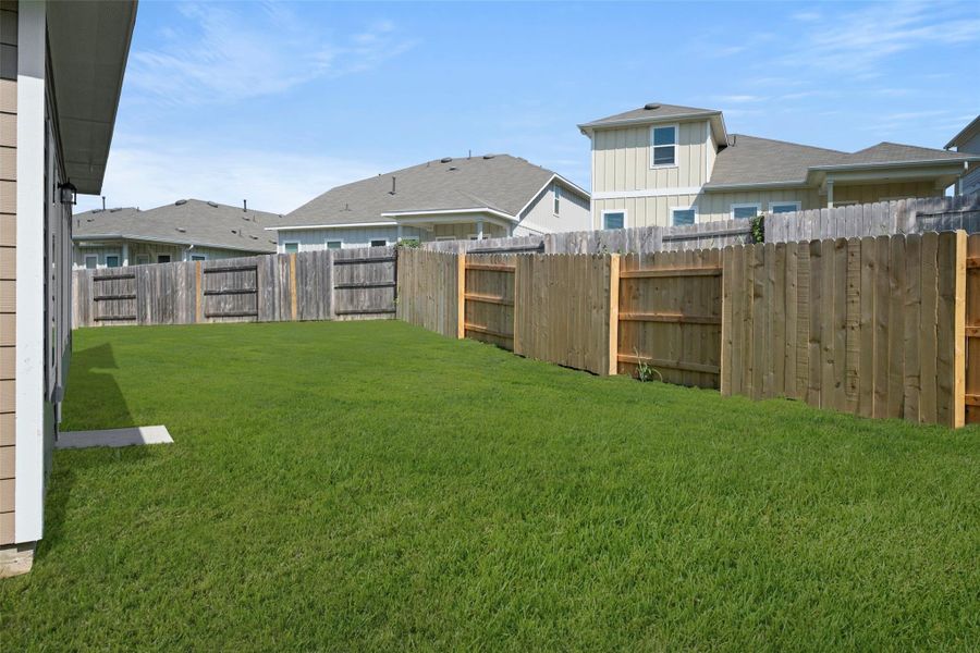 Exterior details and patio area of a home in Cloverleaf, Austin (Image 3).