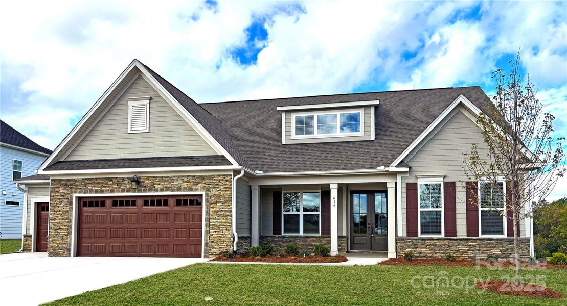 Front exterior of a new home in Brighton Park, Mount Pleasant, NC, highlighting curb appeal (Image 1).
