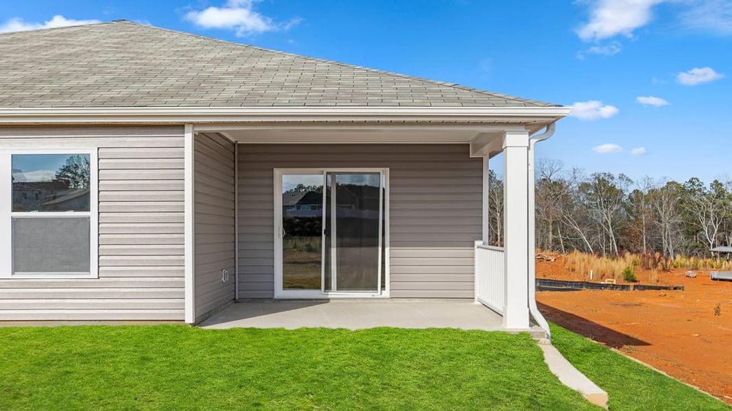 Exterior details and patio area of a home in Lakestone, Woodruff (Image 3).