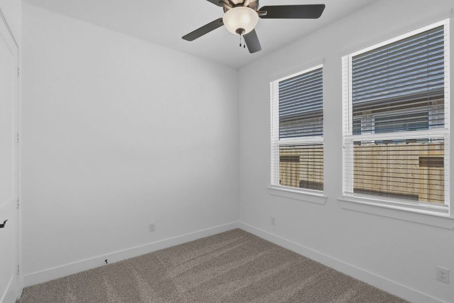 Representative unfurnished interior of a home built from the Palmer by Chesmar Homes in Riceland Alley Loads, Mont Belvieu (Image 19).
