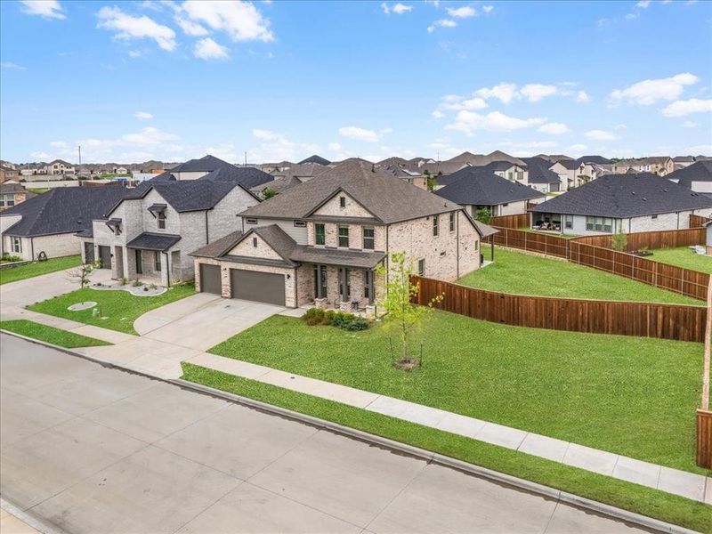 Front exterior of a new home in , Fort Worth, TX, highlighting curb appeal (Image 22).