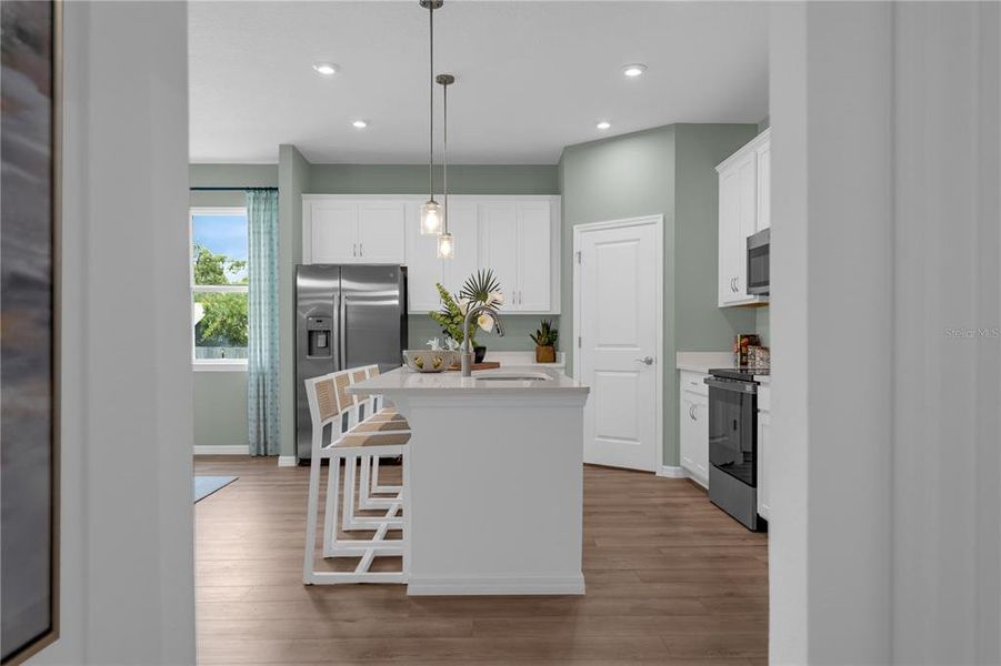 Furnished interior view inside a new home in Covered Bridge at Liberty Bluff, Haines City (Image 6).
