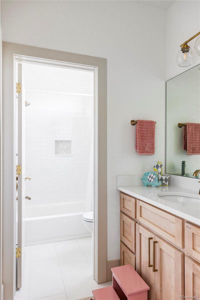 En-Suite Bathroom in one of the Secondary Bedrooms. There are 4 bedrooms on the top floor