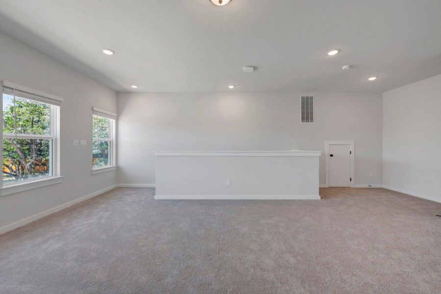 Spacious, unfurnished interior of a new home in Heritage, Dripping Springs (Image 23).