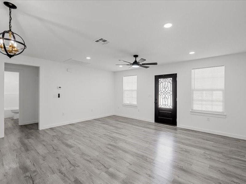 Foyer entrance featuring light wood-style flooring, recessed lighting, and ceiling fan