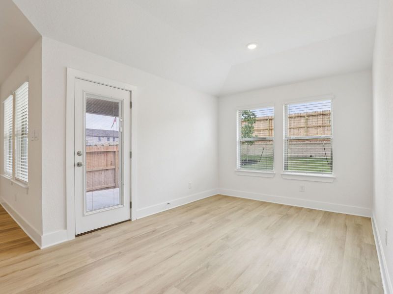 Dining in the Callaghan floorplan at a Meritage Homes community.