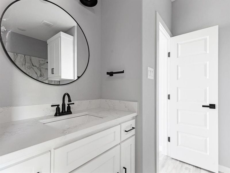 Bathroom featuring vanity