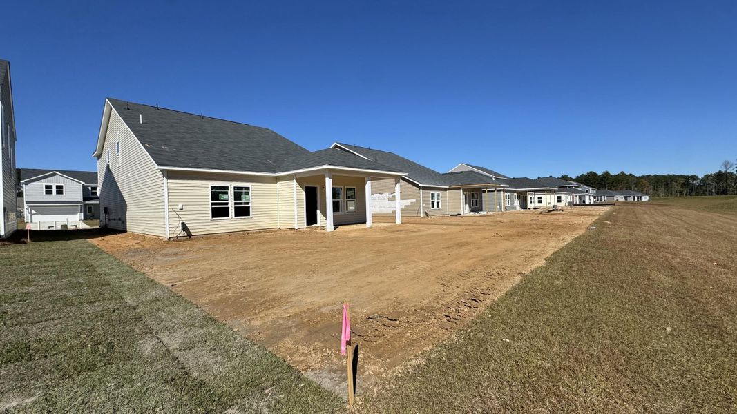Exterior details and patio area of a home in Watson Hill, Summerville (Image 4). Exterior details and patio area of a home in Watson Hill, Summerville (Image 4).