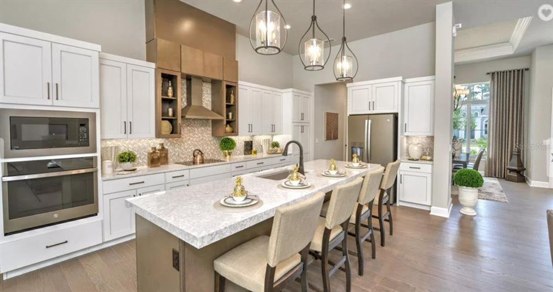 Furnished interior view inside a new home in Plantation Bay, Ormond Beach (Image 4).