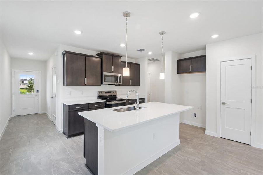 Furnished interior view inside a new home in Grasslands West, Lakeland (Image 6).