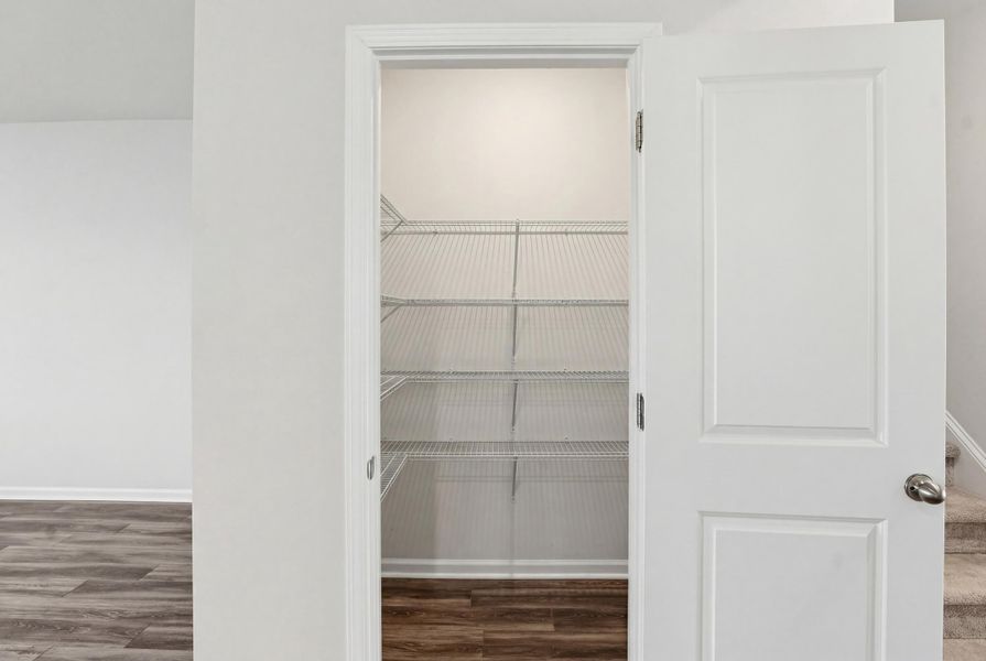 Spacious, unfurnished interior of a new home in Sanctuary Cove at Cane Bay, Summerville (Image 19).