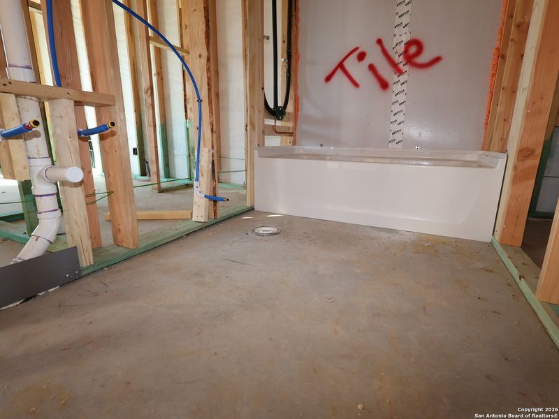 In-progress construction of a new home in Chaparral Ranch, Floresville, TX (Image 28).