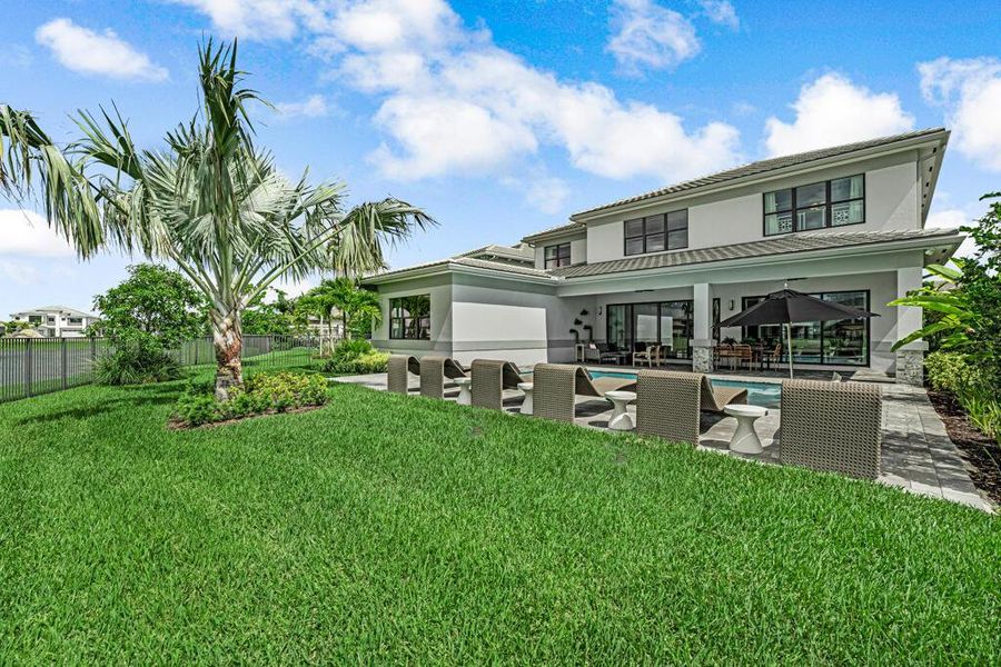 Exterior details and patio area of a home in Apex at Avenir, Palm Beach Gardens (Image 42).