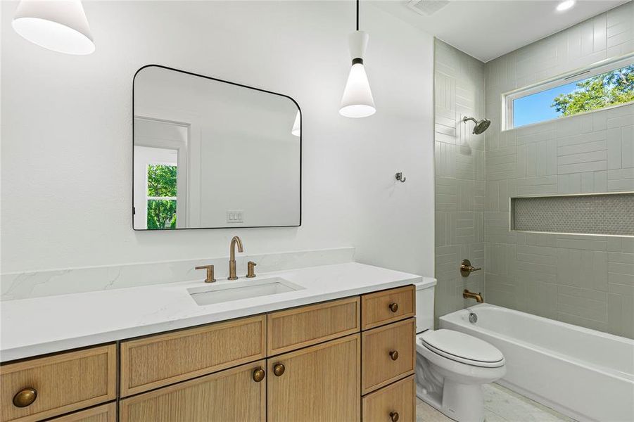 Full bathroom featuring vanity and shower / bathtub combination