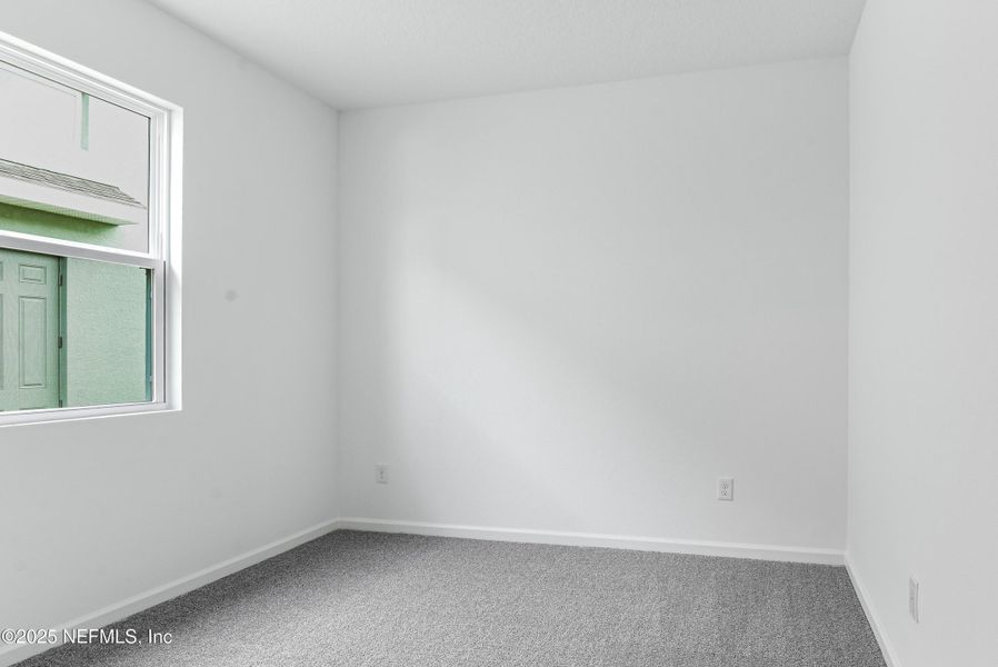 Spacious, unfurnished interior of a new home in Seasons at Grandview Gardens, Deland (Image 12).