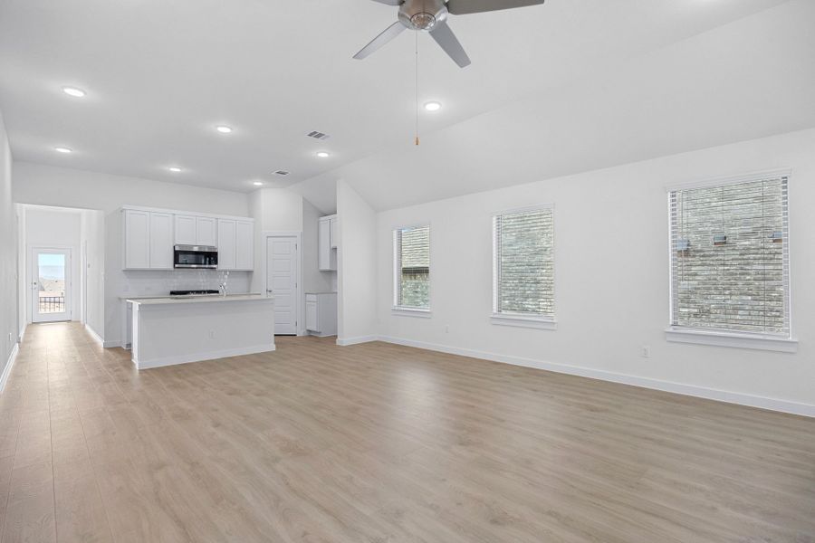 Kitchen in the Cypress home plan by Trophy Signature Homes - REPRESENTATIVE PHOTO