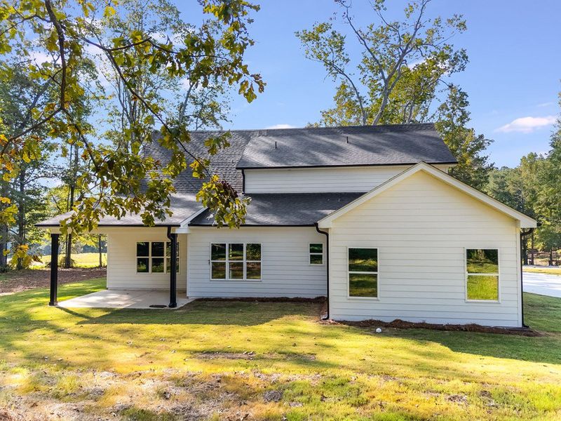 Front exterior of a new home in LOVVORN ESTATES, Carrollton, GA, highlighting curb appeal (Image 26).