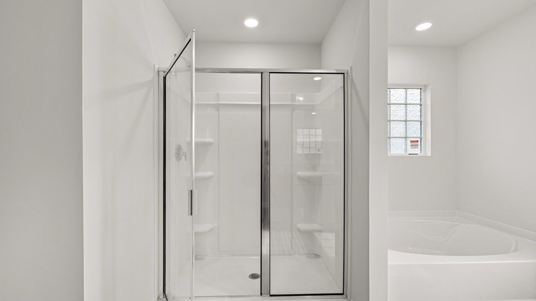 Representative furnished interior of a home built from the HALTON by D.R. Horton in Lost Creek, Dallas (Image 14).