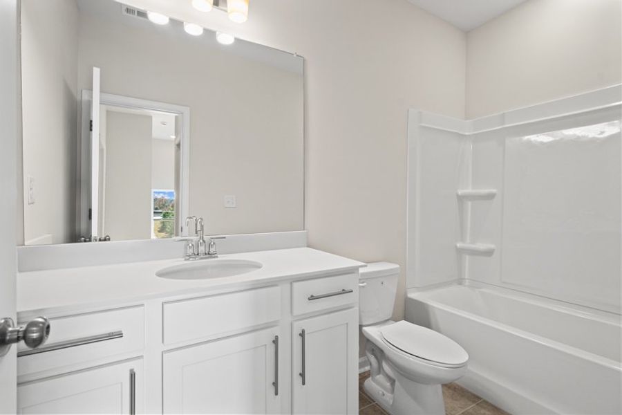 Representative furnished interior of a home built from the Collins by Taylor Morrison in Henson Square, Lawrenceville (Image 32).