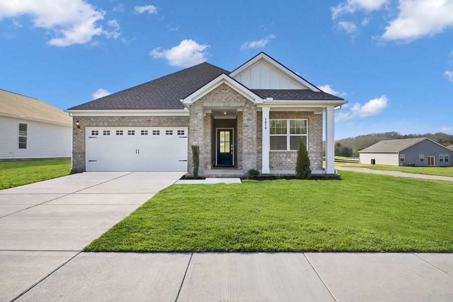 Front exterior of a new home in Spring Valley Estates, Lewisburg, TN, highlighting curb appeal (Image 1). Front exterior of a new home in Spring Valley Estates, Lewisburg, TN, highlighting curb appeal (Image 1).