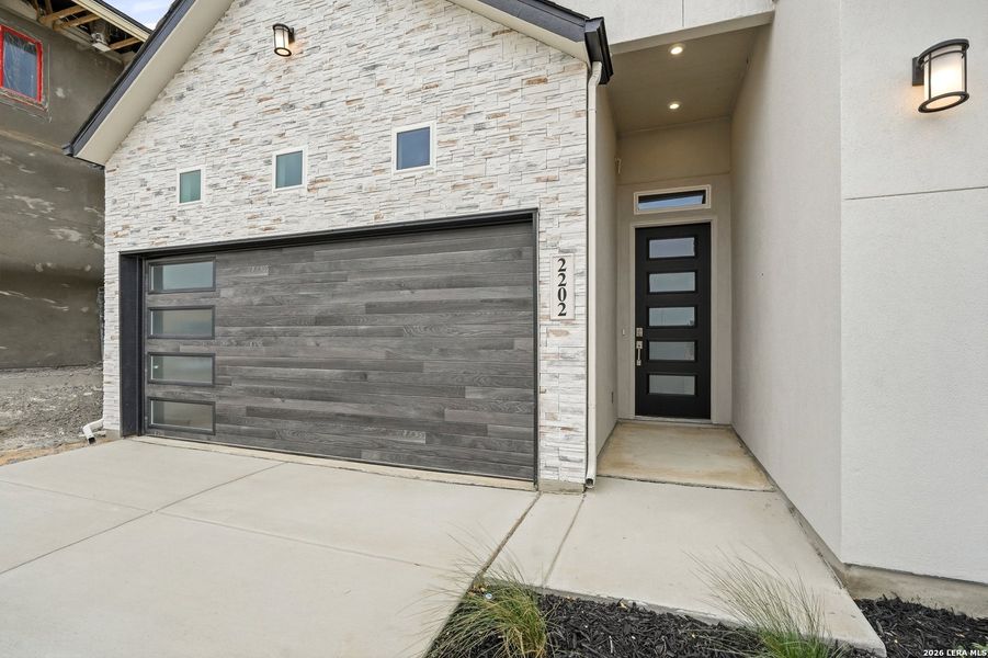 Exterior details and patio area of a home in Prominence, San Antonio (Image 24).
