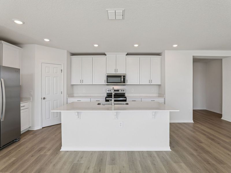 Furnished interior view inside a new home in Lake Deer Estates - Signature Series, Poinciana (Image 3).