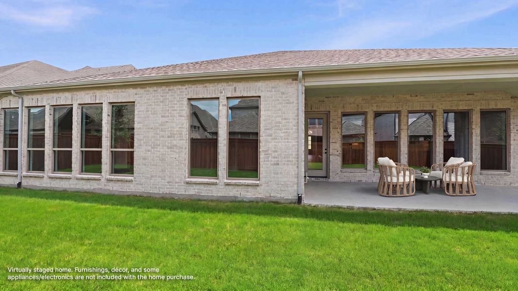 Exterior details and patio area of a home in Terraces, Rockwall (Image 2).
