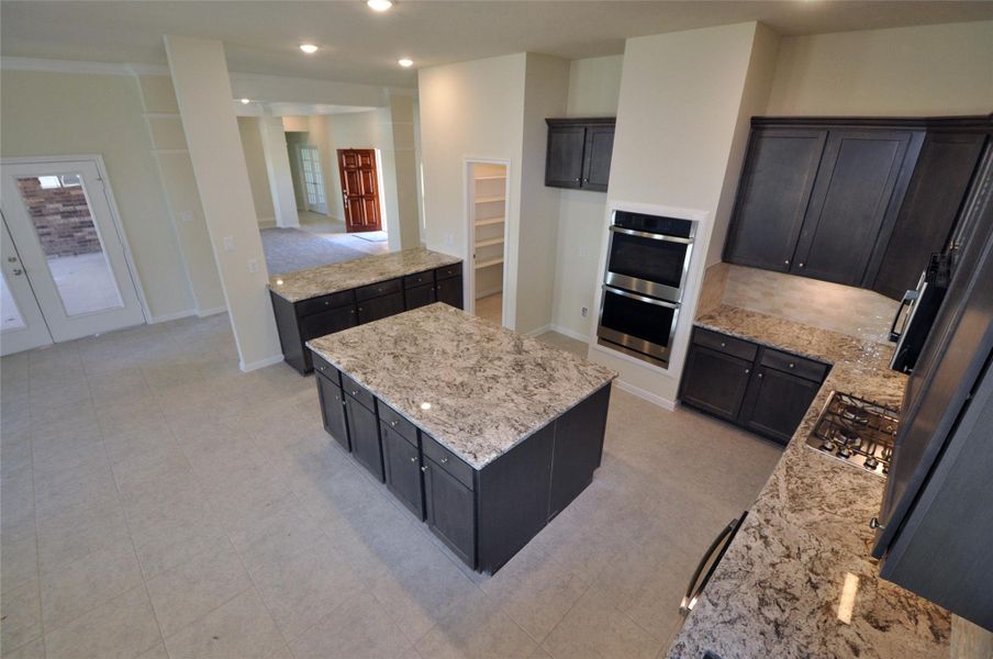 Furnished interior view inside a new home in Pedregal, League City (Image 7).