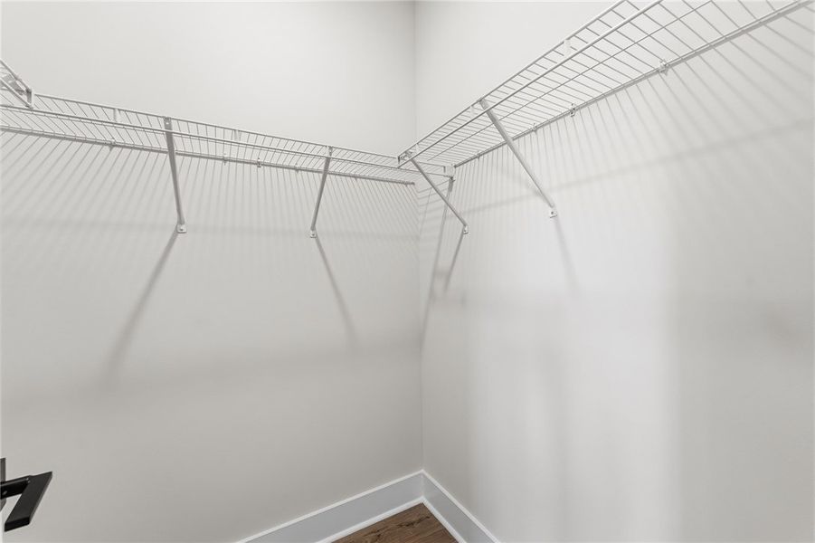 This spacious closet features wire shelving for op