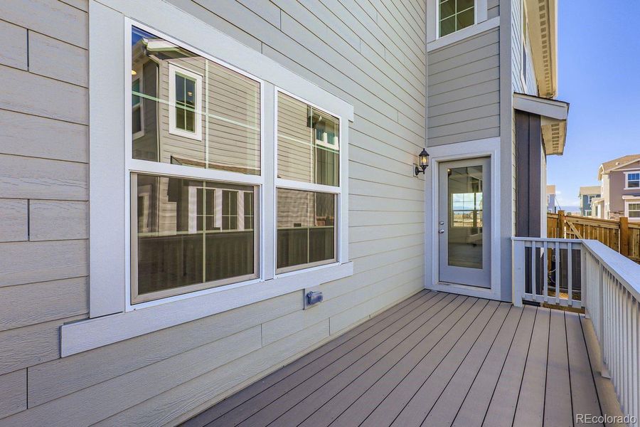 Front exterior of a new home in , Thornton, CO, highlighting curb appeal (Image 1).