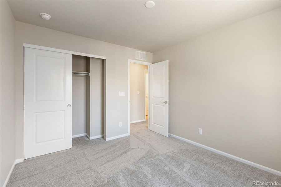 Spacious, unfurnished interior of a new home in Woodrose at Painted Prairie, Aurora (Image 16).