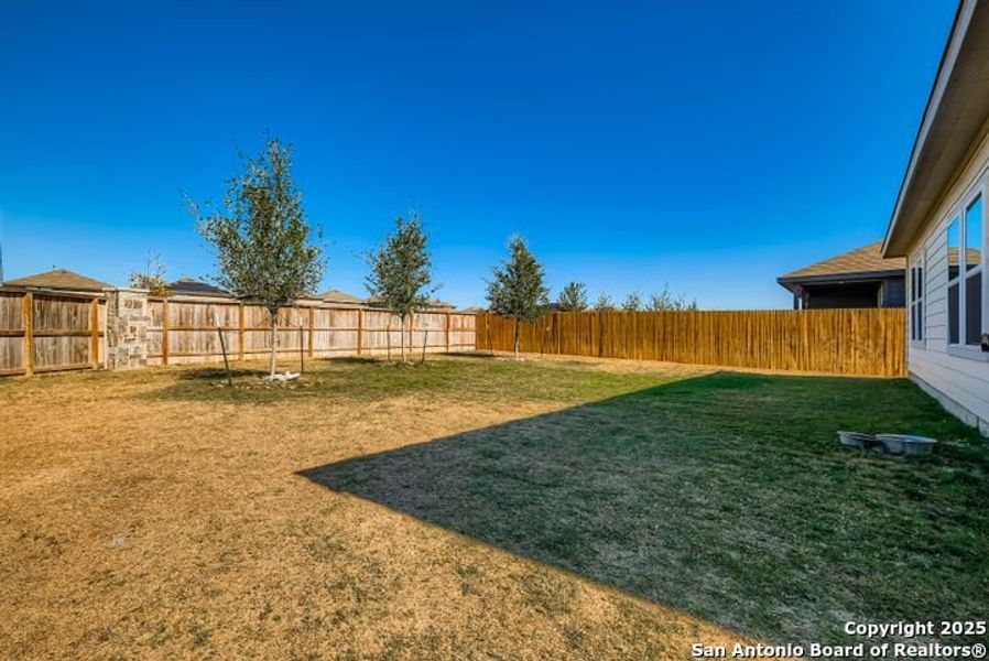 Exterior details and patio area of a home in Riverstone at Westpointe, San Antonio (Image 24).