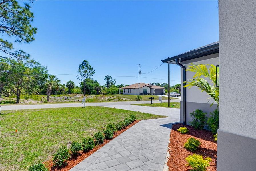 Exterior details and patio area of a home in , North Port (Image 27).