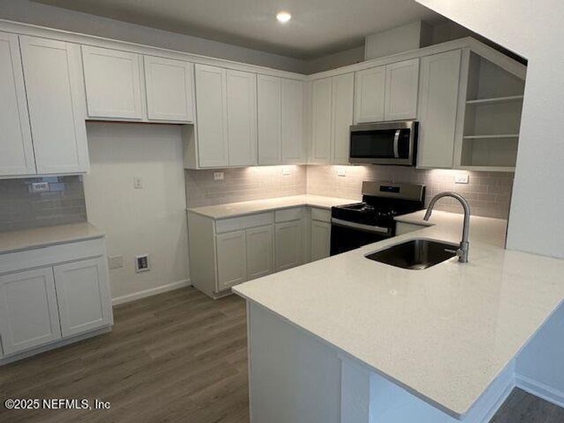 Furnished interior view inside a new home in Brook Forest - Villas, St. Augustine (Image 11).