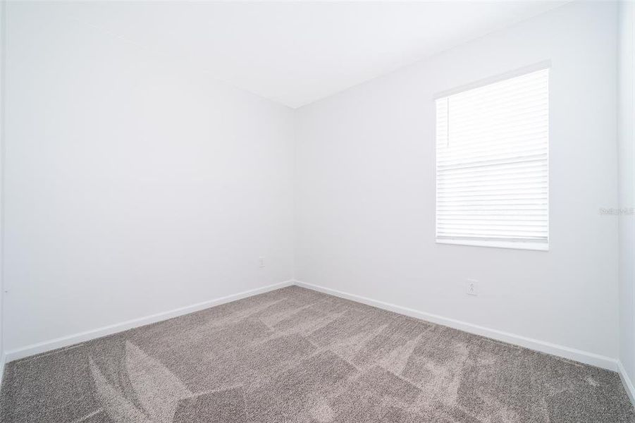 Spacious, unfurnished interior of a new home in Windsong: Estate Collection, Leesburg (Image 12).