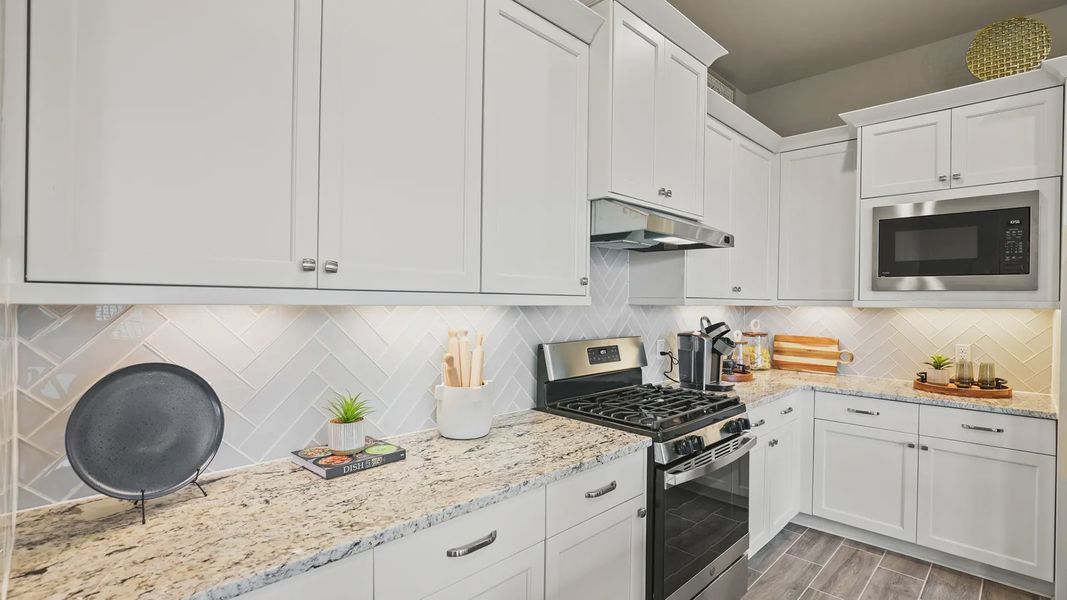 Representative furnished interior of a home built from the Oxford by Chesmar Homes in Bridgeland 45's, Cypress (Image 12).