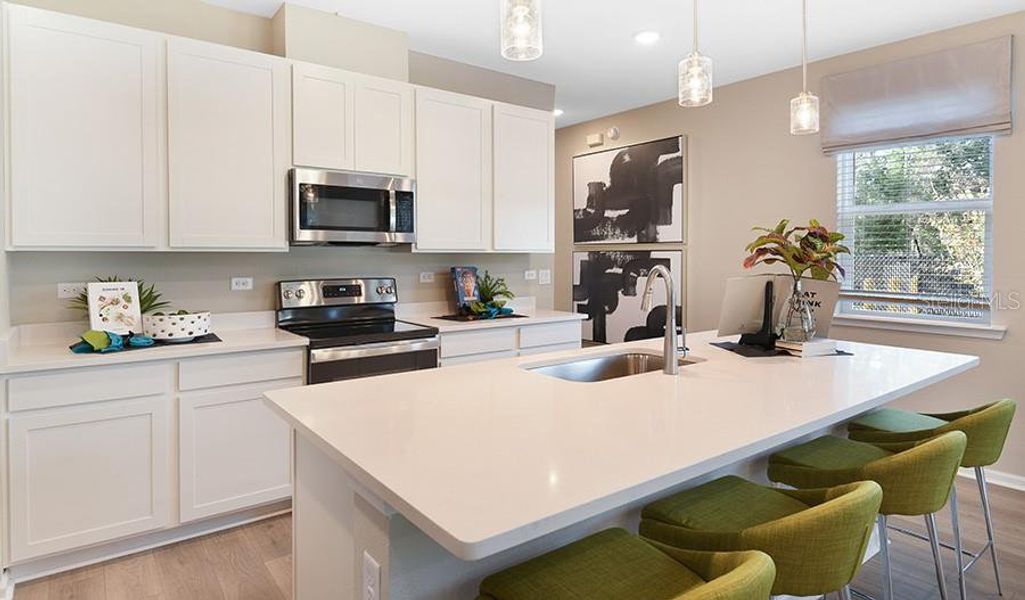 Furnished interior view inside a new home in Seasons at Shores of Lake Dell, Dundee (Image 8).