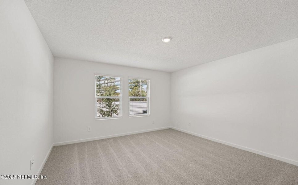 Spacious, unfurnished interior of a new home in Flagler Village - Classic Series, Palm Coast (Image 17). Spacious, unfurnished interior of a new home in Flagler Village - Classic Series, Palm Coast (Image 17).