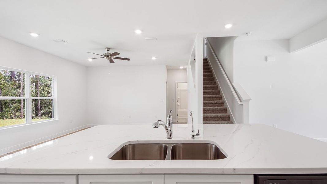 Representative unfurnished interior of a home built from the Carol by D.R. Horton in Holley Grove at Peach Creek, Santa Rosa Beach (Image 11).