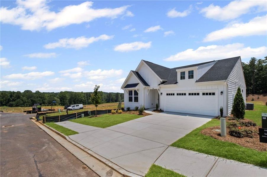 Front exterior of a new home in Easton Park, Dallas, GA, highlighting curb appeal (Image 19).