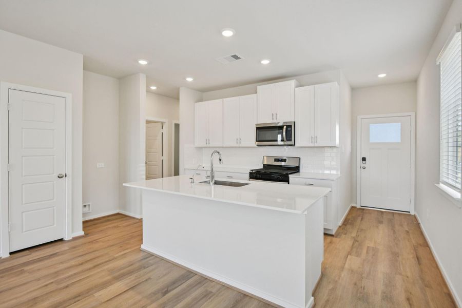 Furnished interior view inside a new home in Sanford Farms - Traditional Series, Waller (Image 15).
