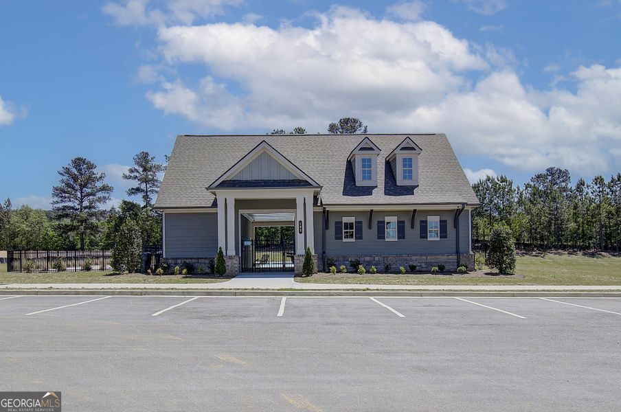 Front exterior of a new home in Enclave at Logan Point, Loganville, GA, highlighting curb appeal (Image 22).