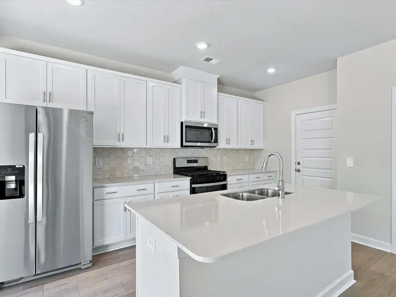 Furnished interior view inside a new home in Creek Ridge - Heritage Collection, Spartanburg (Image 4).