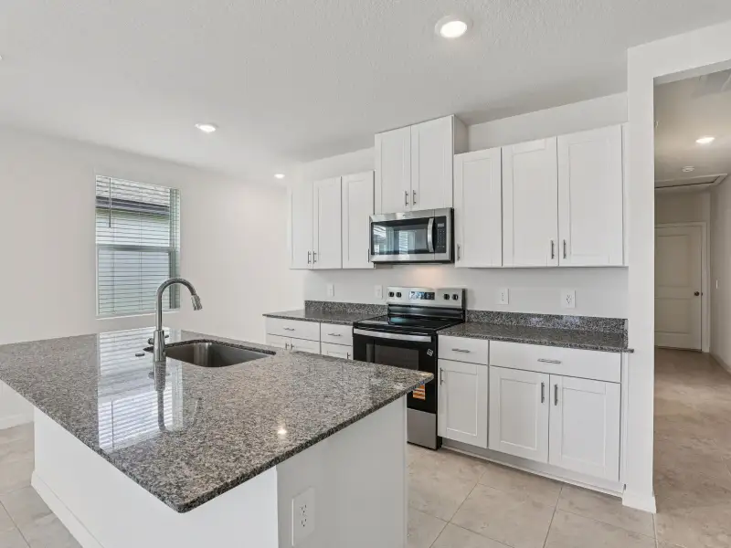 Furnished interior view inside a new home in The Reserve at Hammock Oaks - Classic Series, Lady Lake (Image 4).