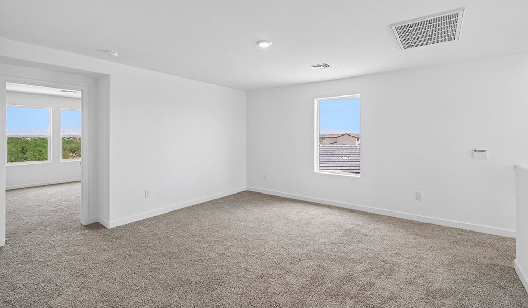 Spacious, unfurnished interior of a new home in The Oasis at Rocking K, Vail (Image 19).
