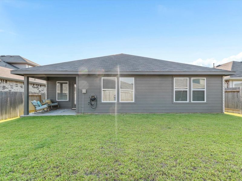 Front exterior of a new home in , Magnolia, TX, highlighting curb appeal (Image 19).