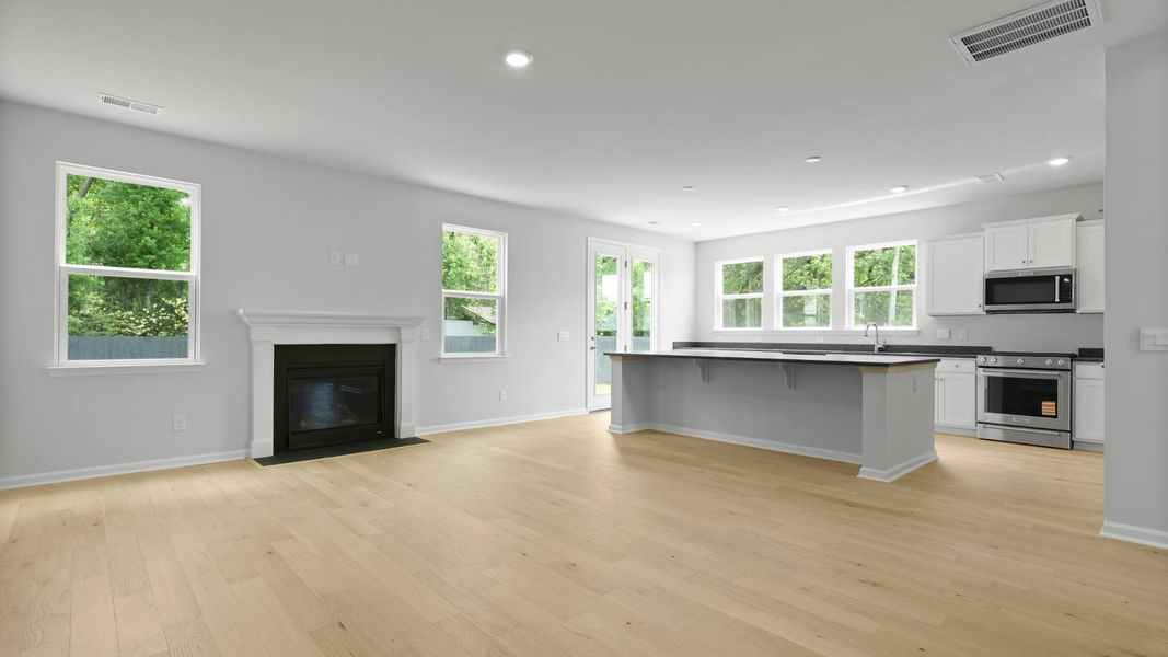 Representative unfurnished interior of a home built from the FORRESTER by D.R. Horton in Founders Corner, Summerville (Image 11).